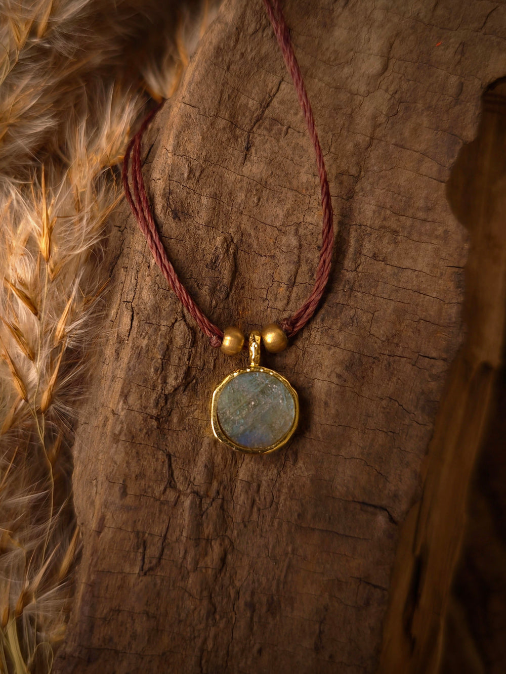 Handmade raw labradorite short necklace with blue-grey gemstone, brown cord and brass bead details boho choker